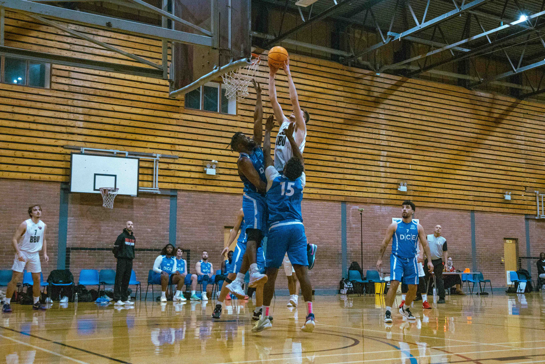 Basketball player in motion during a Bristol Basketball United game